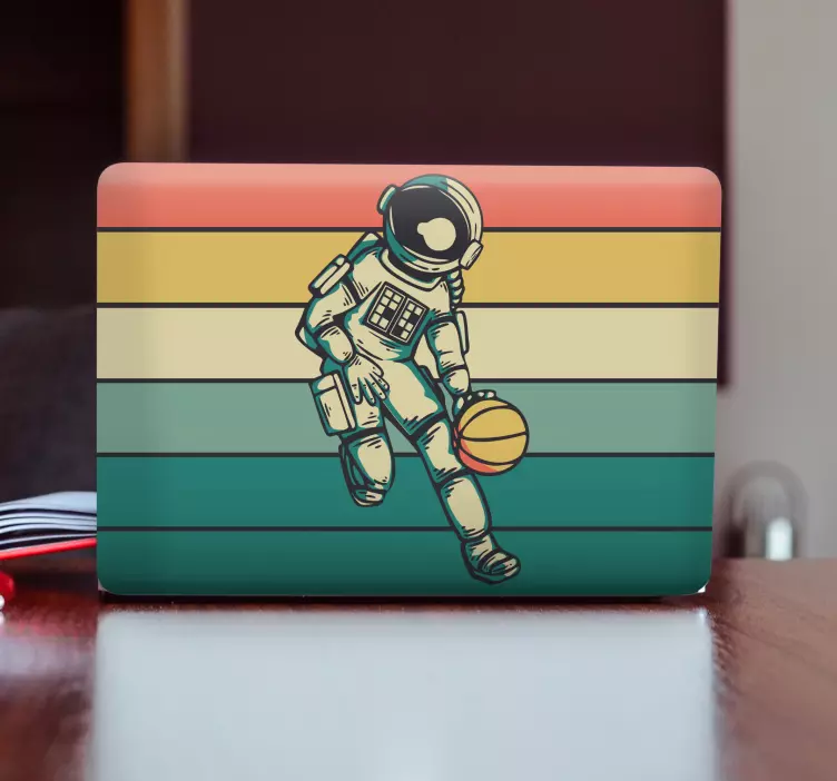 Astronaut spiller bold klistermærke til bærbar - TenStickers
