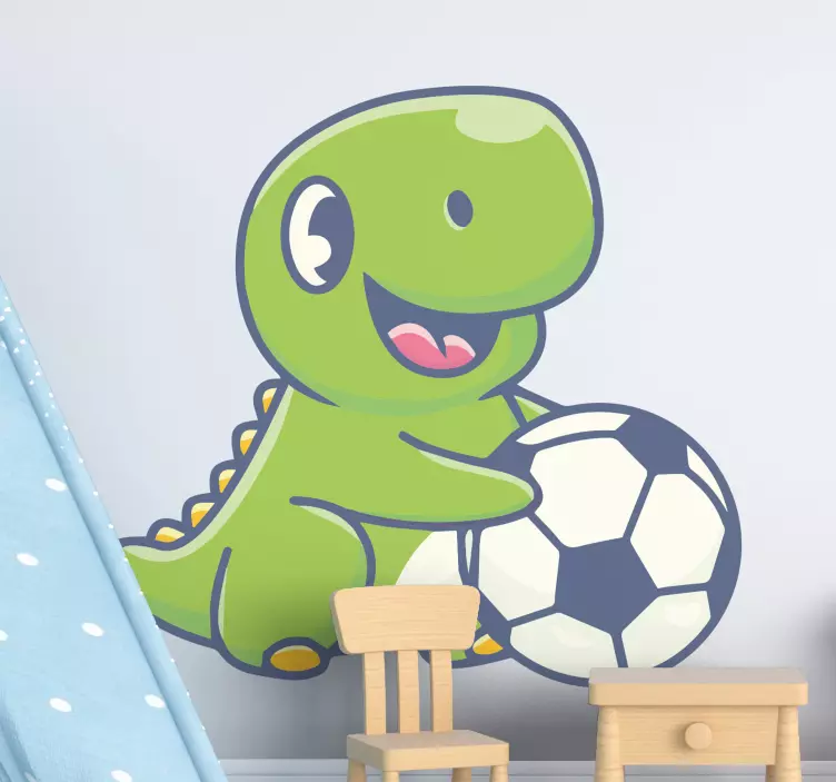 Sød dinosaur holder fodbold vinyl klistermærke - TenStickers
