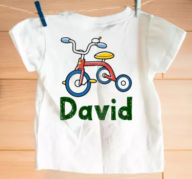 Tegneserie cykel med navn baby t-shirt - TenStickers