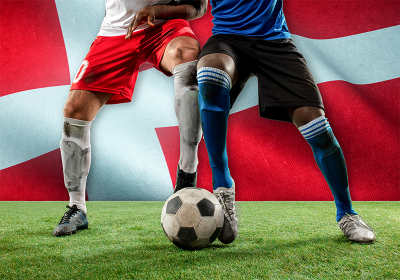 Dansk fodboldspiller, der tackler vintage tæppe - TenStickers